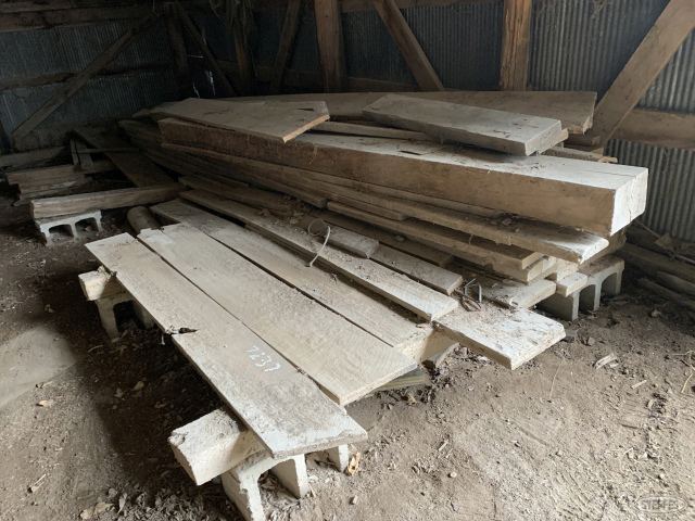 Pile of home sawed dimension lumber